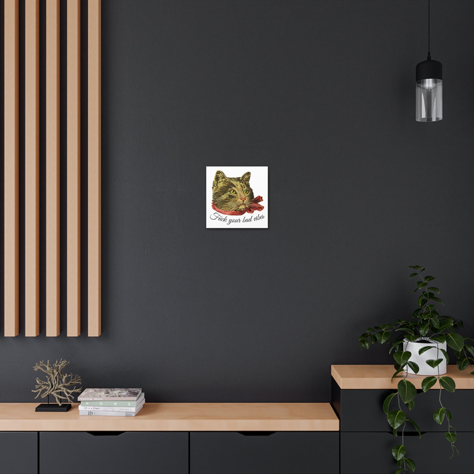 canvas wrap featuring the phrase "Fuck Your Bad Vibes" in elegant cursive beneath a charming vintage graphic of a stylish cat sporting a scarf mounted on wall.